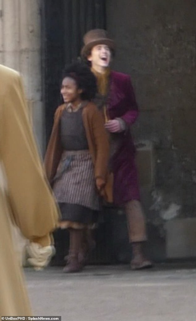Having a laugh: In-between takes the actor talked to the crew and larked around with another cast member