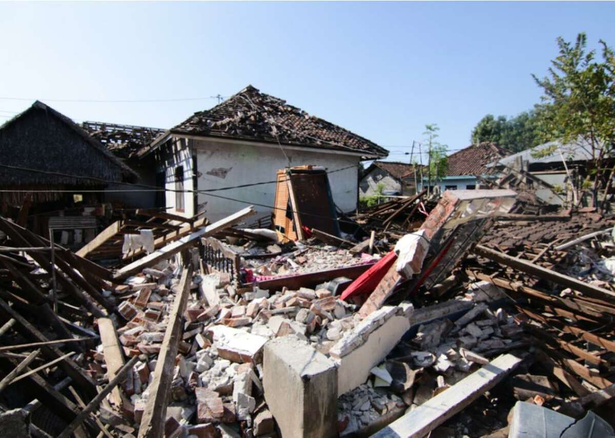 Earthquake - Economic damages between 2010–20: 0.0005% of GDP When working on a building resilient to earthquake damage, be sure to include base isolators. Conventional buildings will shake with the ground during an earthquake, and when they shake too much, structural elements can sustain heavy damage, sometimes to the point of destruction. Base isolators act as shock absorbers between the building and the moving ground. This lets the building slide back and forth instead of shaking during an earthquake, so it will still remain upright. Layers of steel and rubber with a lead core built between the floor and the foundation will also help to isolate the building from ground motion. Steel plate wall systems can mitigate earthquake damage as well. The Ritz-Carlton/JW Marriott hotel building in Los Angeles is the first to use an advanced steel plate shear wall system to resist earthquakes. At 54 stories tall, the hotel must be able to withstand earthquakes.