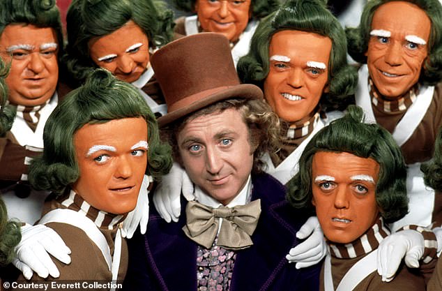 Throwback: The Oompa-Loompas' part in the movie had previously been undetermined due to fears of a 'racist' connotation, according to reports (Gene Wilder, centre, pictured in 1971)