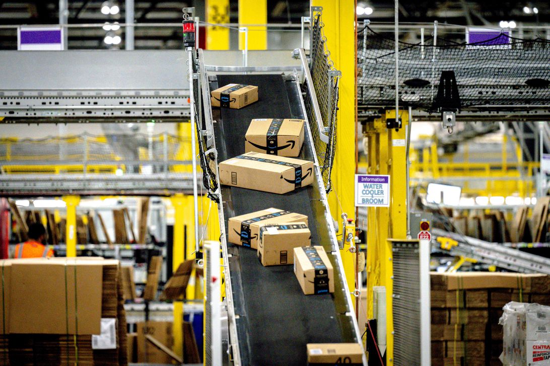 Packages move along a conveyor at Amazon fulfillment center