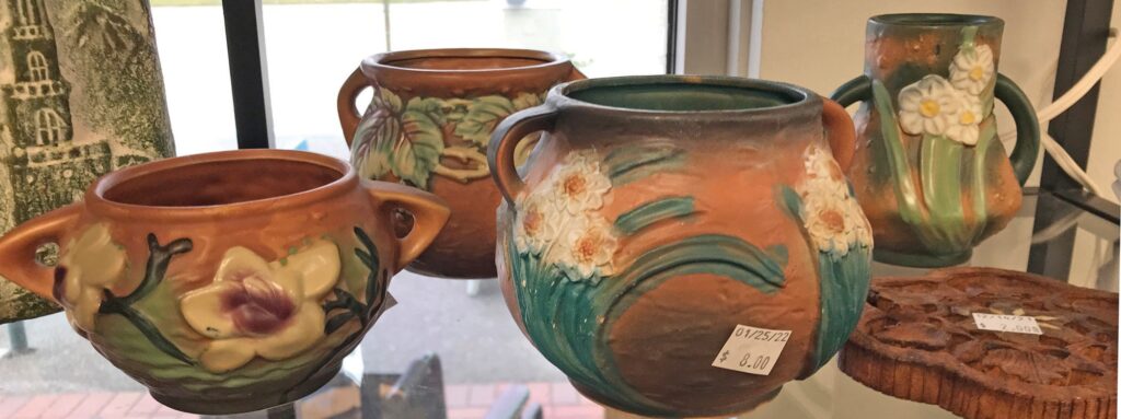 ABOVE: Reproductions of Roseville Pottery in the Magnolia and Jonquil patterns (front). SCOTT SIMMONS / FLORIDA WEEKLY