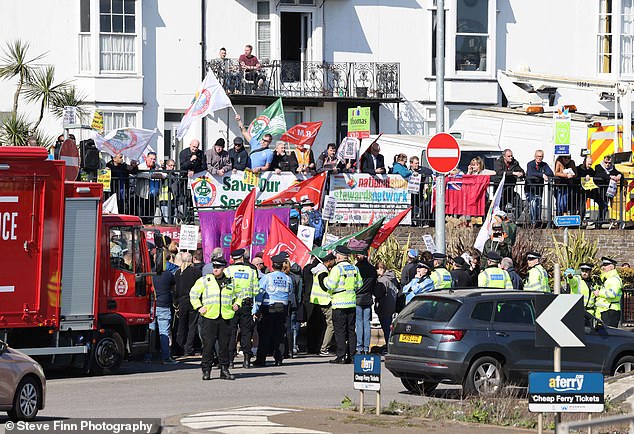Dover: Police hold the protesters back as they approached the port this afternoon
