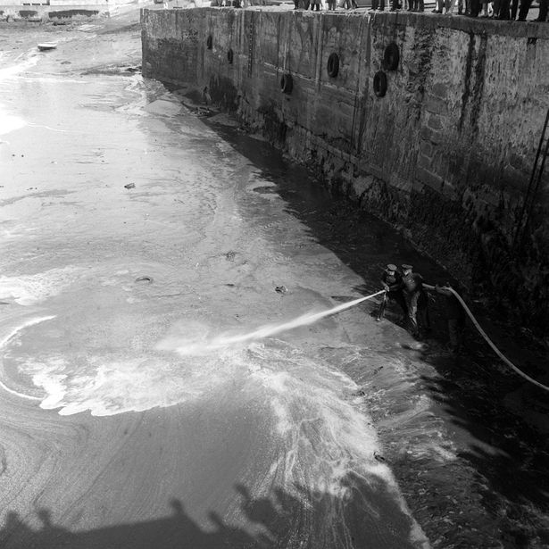 Detergent being pumped into the sea at Penzance to wash away the oil slick from the Torrey Canyon