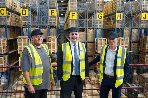 Mayor Houchen with Stephen Wilson (left) and Mark Callaghan (right) in the new warehouse
