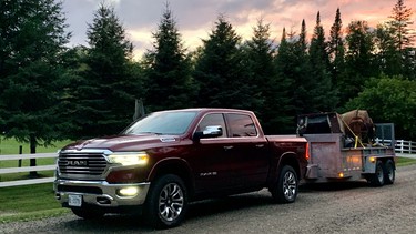 Loaded up with the 2021 Ram 1500 Longhorn eTorque. This load grossed ~6,400lbs. equipment was chained with binders to rings within the trailer.