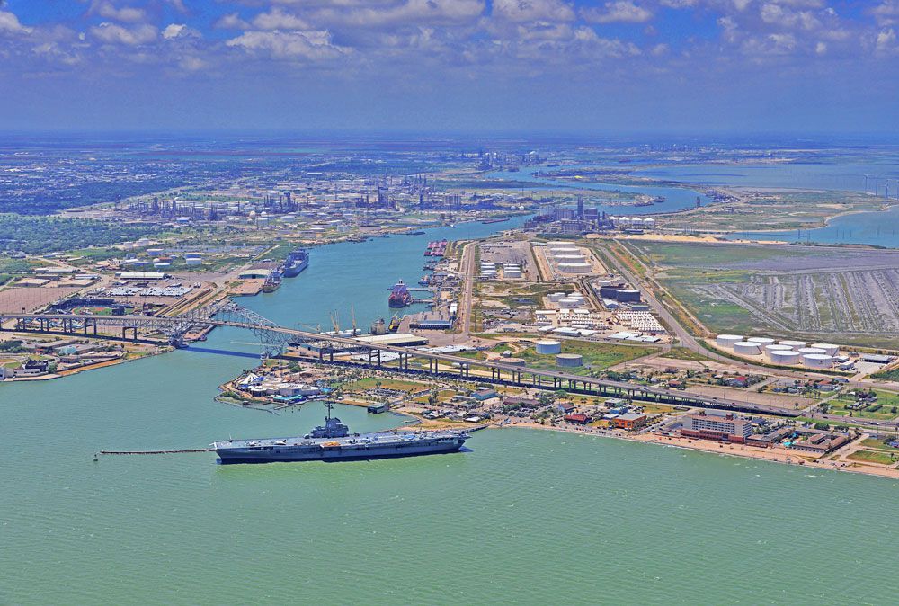 Port Corpus Christi, with a U.S. Navy aircraft carrier in the foreground. (Photo: workboat.com)