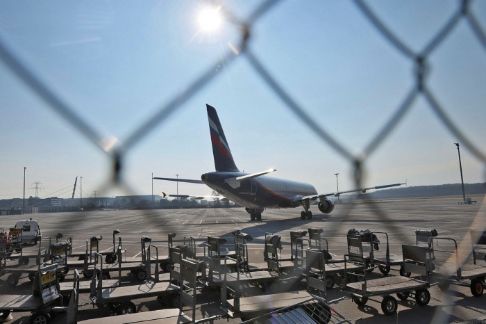 An Aeroflot jet is parked at an airport in Geneva, Switzerland