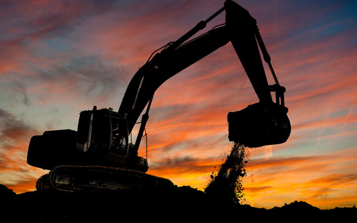 Loader excavator at work, sand mine generic.