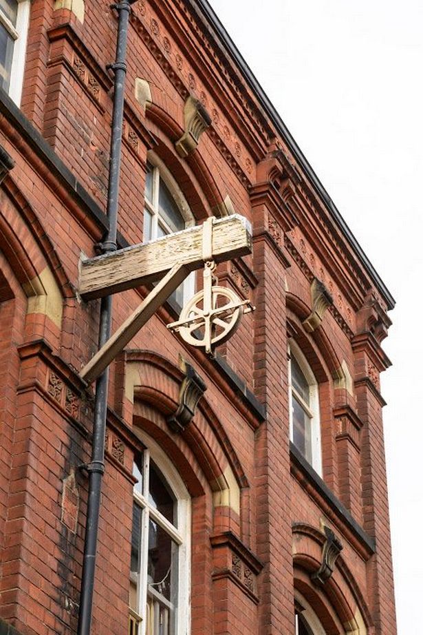 The distinctive pulley beam on the front of Standidge Buildings in Hull's Old Town