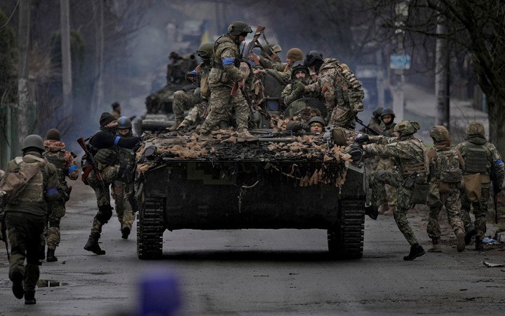 Ukrainian troops on the outskirts of kyiv. AP Photo