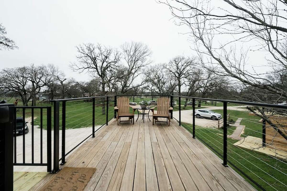 This home in Waco can accommodate up to six guests and features a rooftop patio.
