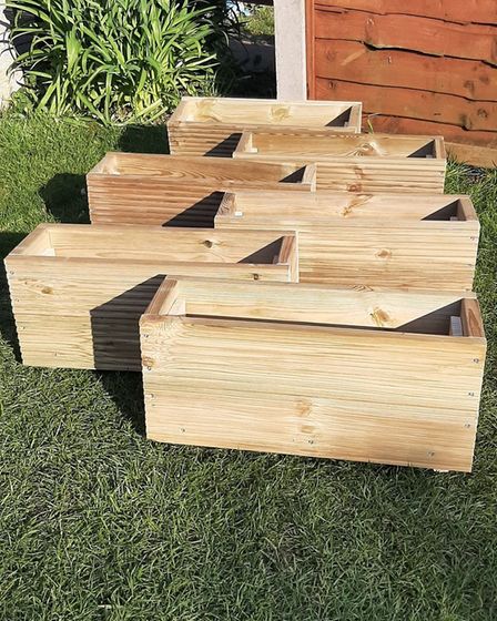 Flower planters made by Ashton to support EACH