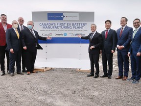 Mark Stewart, COO, North America for Stellantis, left, Vic Fedeli, Ontario minister of economic development, job creation and trade, Windsor Mayor Drew Dilkens, Ontario Premier Doug Ford, Federal Minister of Economic Development, Job Creation and Trade François-Philippe Champagne, David Kim, Head of Digital Technology and E-Commerce Solutions at LG Electronics North America, MP Irek Kusmierczyk, Windsor-Tecumseh and Federal Minister of Innovation, Science and Industry, Omar Alghabra are shown at a press conference on Wednesday, March 23, 2022 in Windsor where a $5-billion dollar investment to build an EV battery plant in the city was announced.