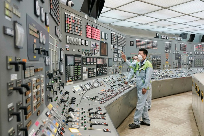 Workers inside a central control room of Jera Co’s liquefied natural gas fired power plant in Japan