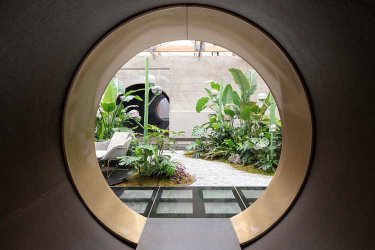 Looking through the tube, from Baiqi café to Acacia island. Image © Zhi Xia