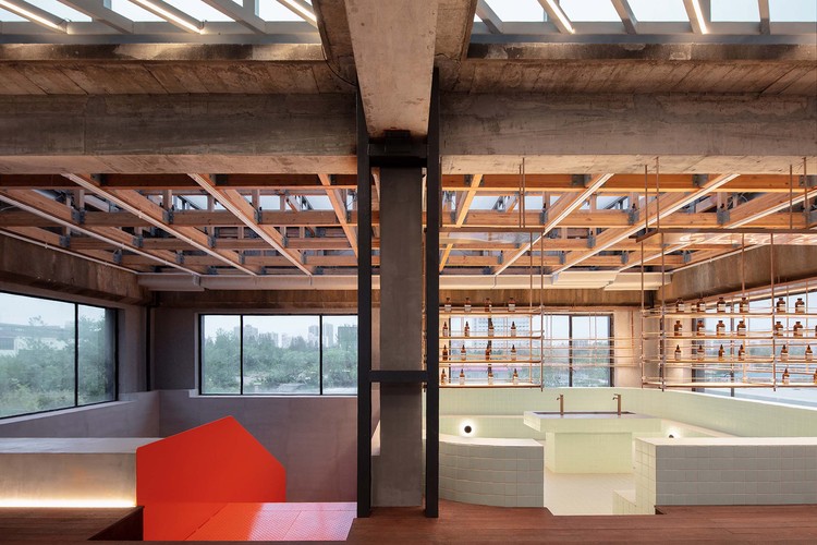 Making soap in the empty swimming pool. Image © Zhi Xia