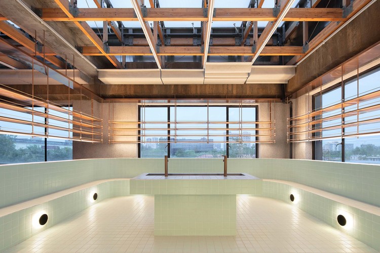 Making soap in the empty swimming pool. Image © Zhi Xia