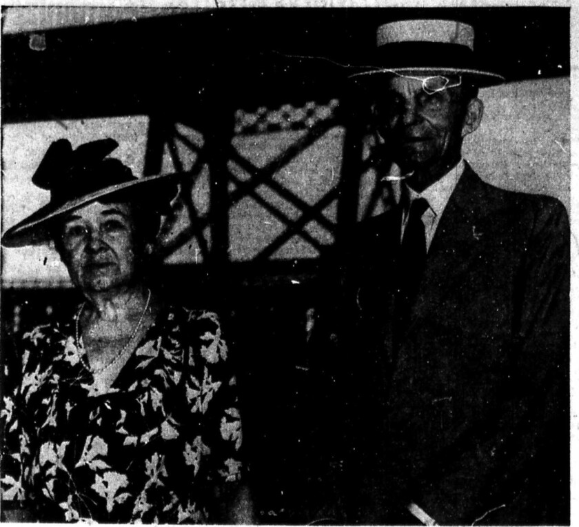 Mr. and Mrs. Henry Ford are shown here on a surprise visit to Superior