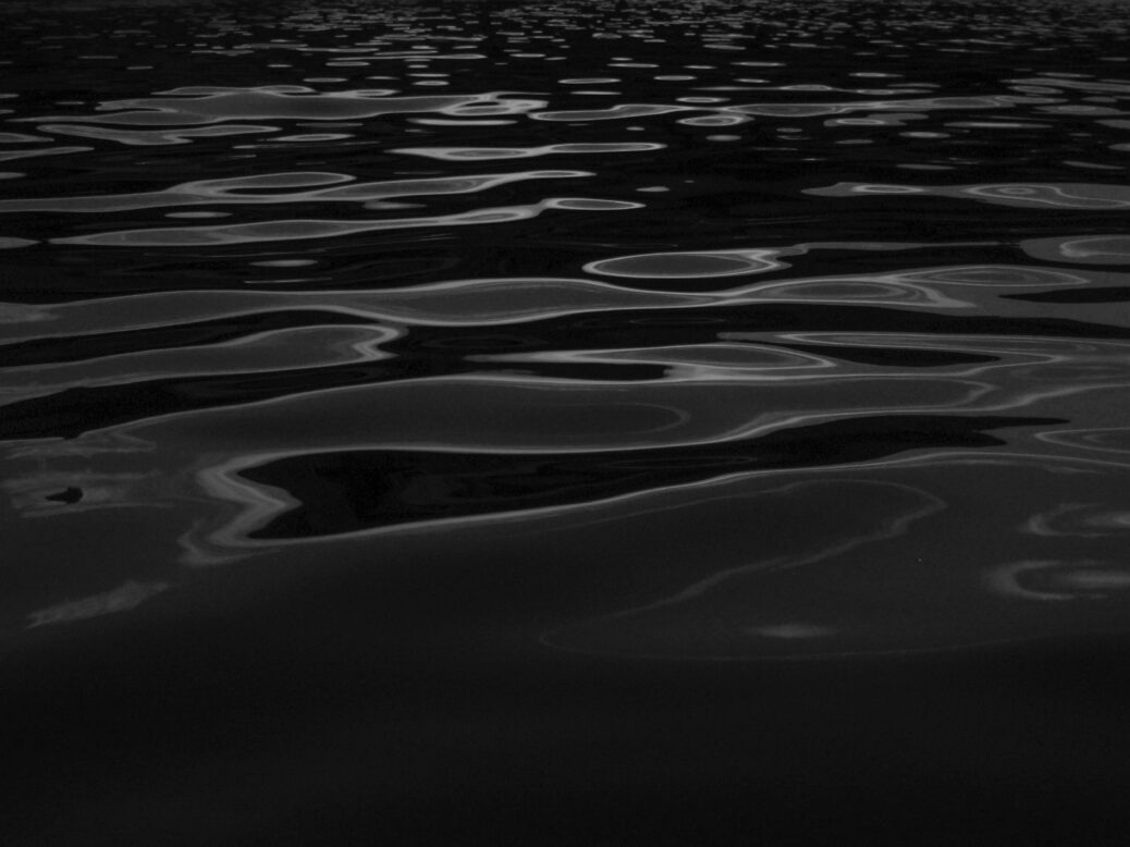 image showing dark waters. One seafarer has been killed as two cargo ships sink in the Black Sea.