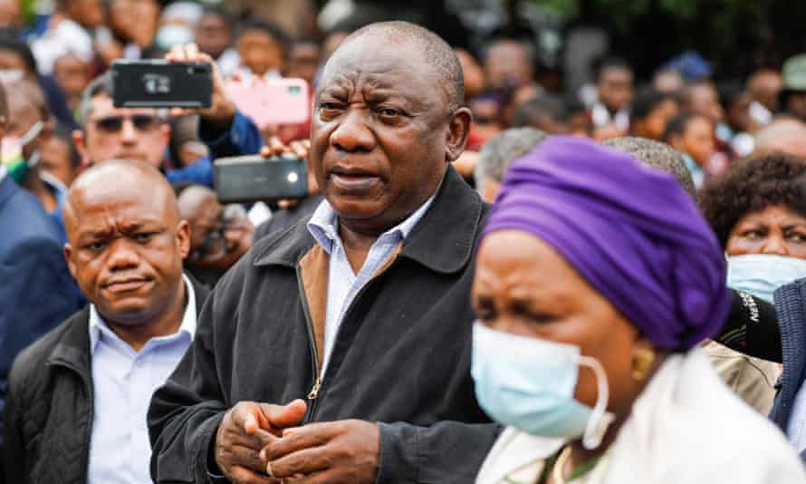 South African President Cyril Ramaphosa speak to grieving family members at the United Methodist Church of South Africa in Clermont, near Durban, on 13 April.
