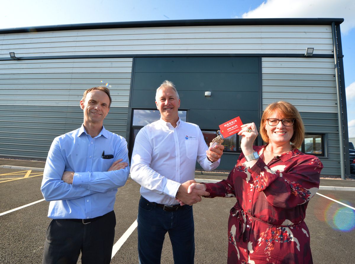 Handing over the keys, Morris Property head of estates Liz Lowe to CEL group sales director Simon Cartwright, with (left) Bulleys Bradbury director Richard Bradbury