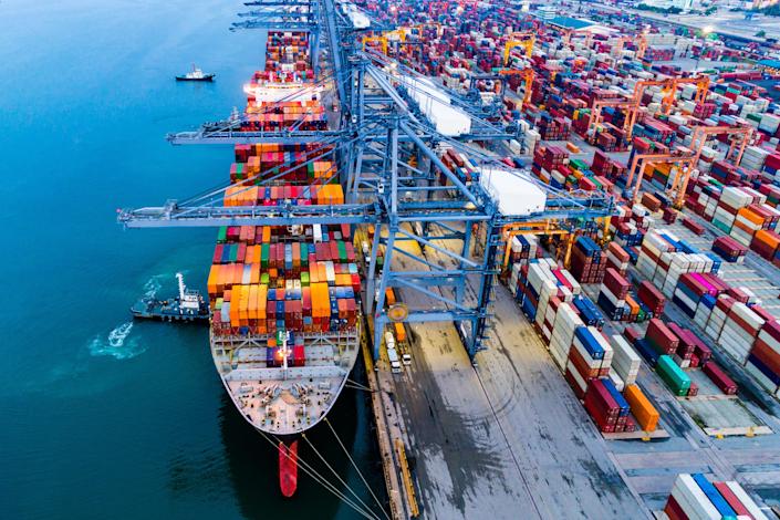 The aerial view shot container warehouse and the harbour.
