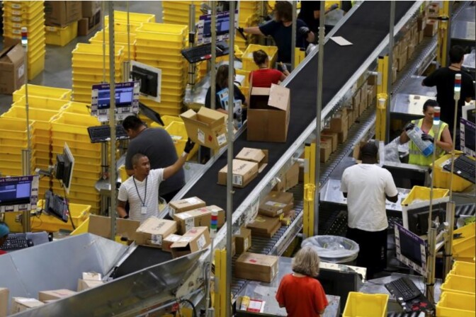 3a_Workers_Sort_Packages_at_Amazon_Fulfillment_Center_Tracy_August-3_2015_REUTERS_Robert_Galbraith.jpg