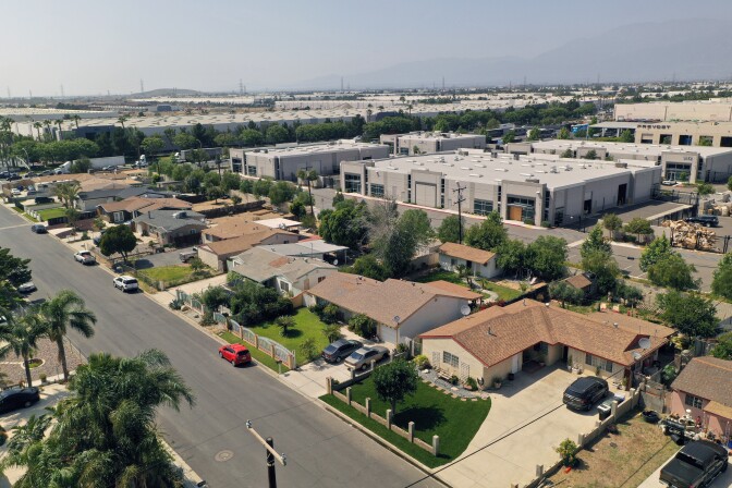 Today the homes in Mira Loma Village are surrounded by warehouses and truck traffic.