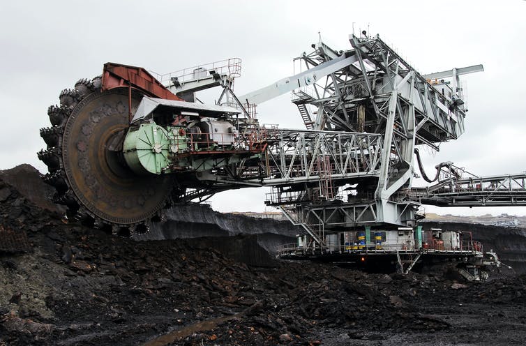 A large bucket-wheel excavator being used in a coal mine.