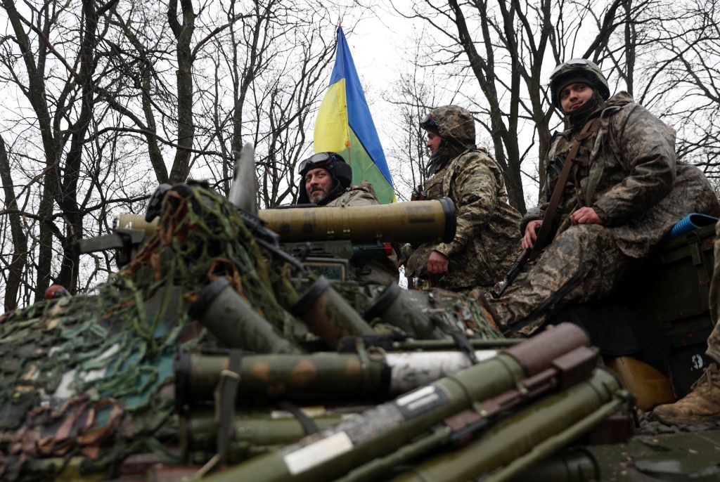 Ukrainian soldiers stand on their armored personnel carrier are spotted in Izyum district, Kharkiv region.