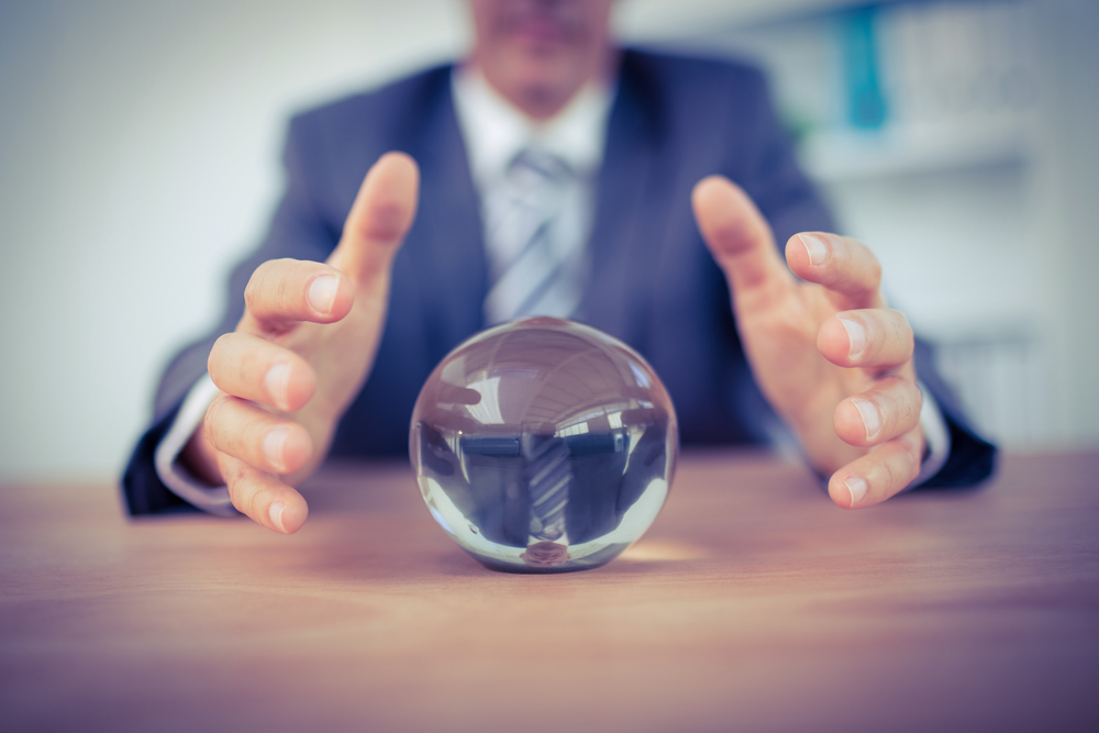 businessman with crystal ball, supply chain predictions