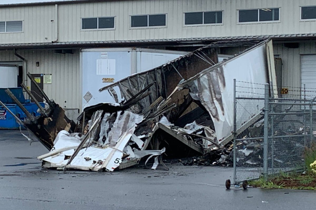 The aftermath of a Friday fire at a North Saanich-based shipping and receiving business that started in the afternoon with crews remaining on scene until midnight. (Wolf Depner/News Staff)