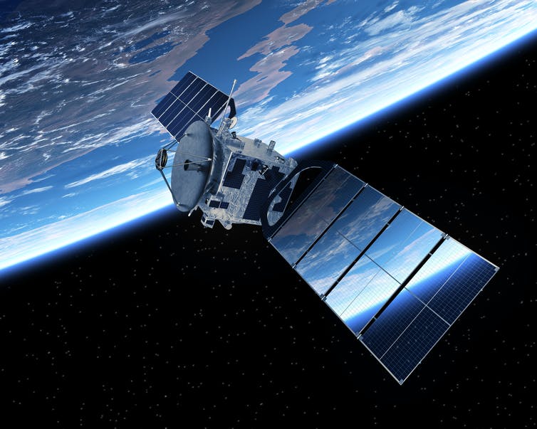 A satellite in space orbits Earth (visible in the background)