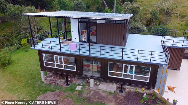 After a 12 month battle which included logistical headaches in hauling multiple containers up the mountain, the couple are putting the finishing touches on their £52,000 project