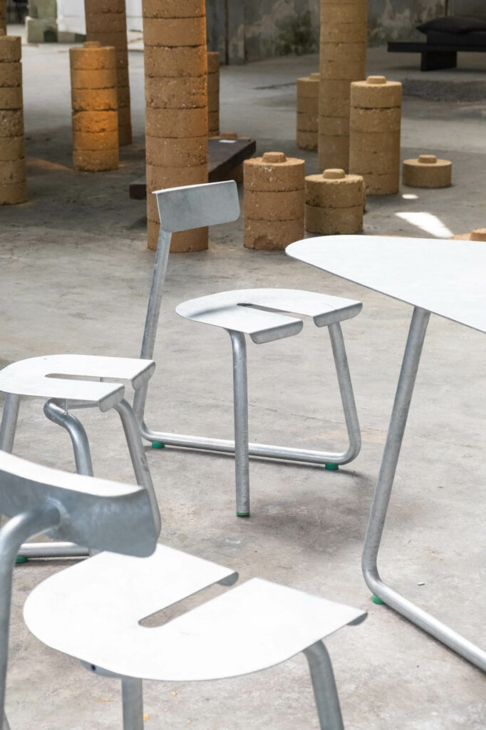 One piece of bent steel pipe is behind the Shaped Pipe chair and stool by Thomas Serruys.