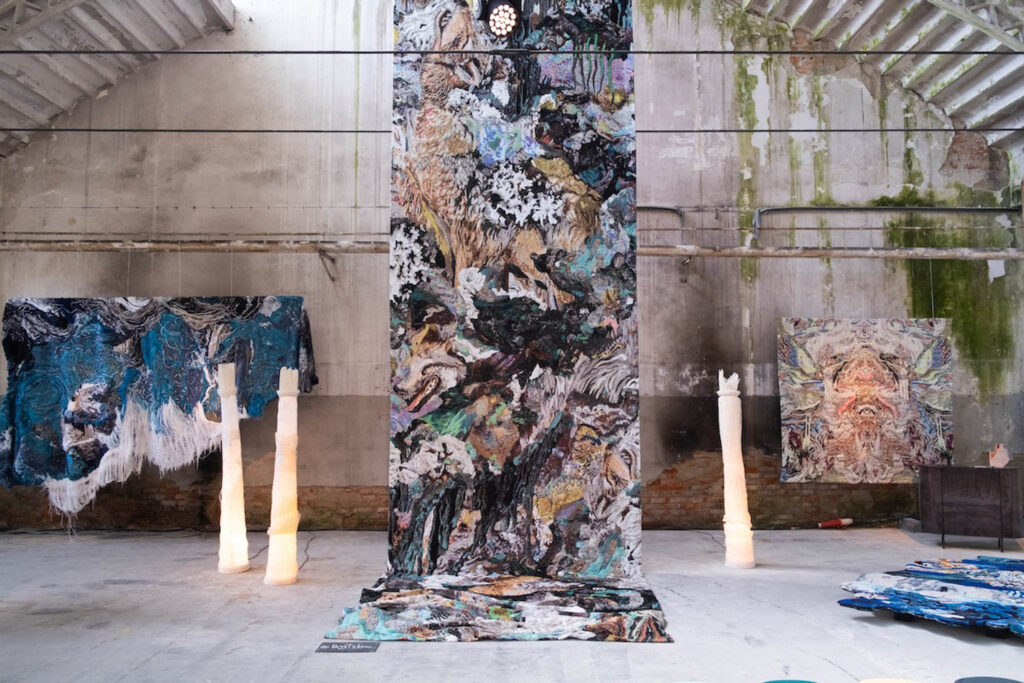Abstract tapestries by Krjst Studio are illuminated by woven standing lamps by RSLT – treated to stay rigid.