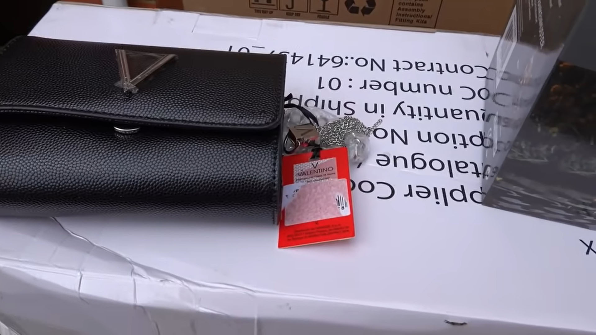 Holly wasn't expecting to unbox a chic Valentino bag