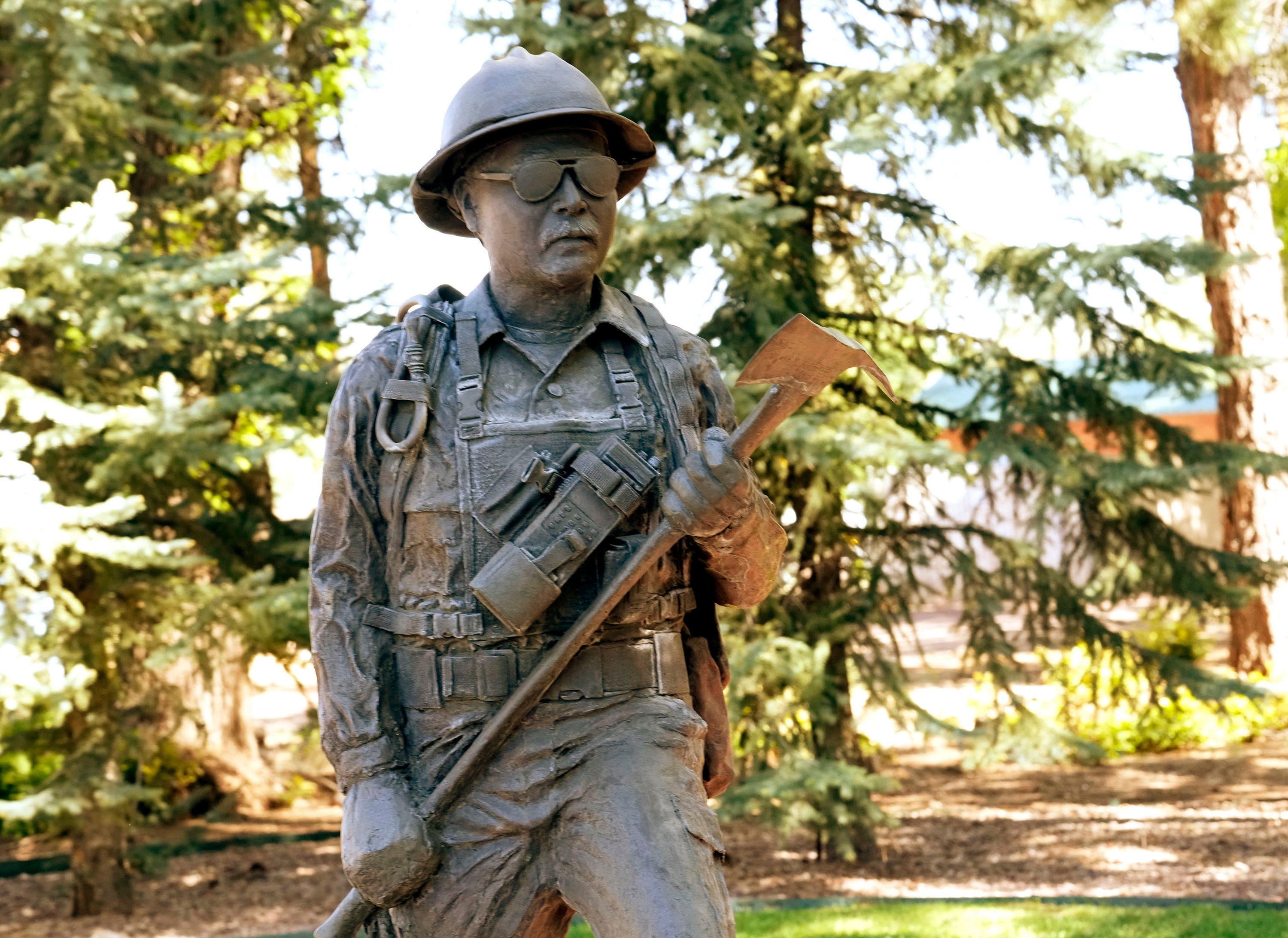 A statue for firefighter Richard "Rick" Glenn Lupe is outside the Show Low library on U.S. 260. Richard "Rick" Glenn Lupe died battling a a forest fire in 2003 near Pinetop-Lakeside.