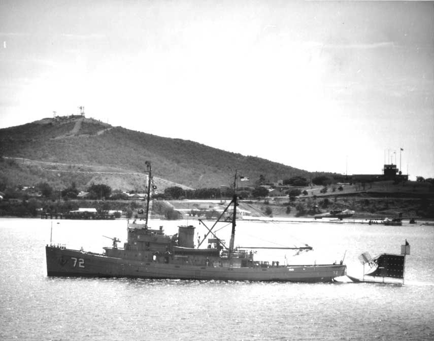 USS Kiowa towing a target sled into Guantánamo Bay, Cuba, in a photograph taken from the anti-submarine warfare carrier USS Intrepid on February 27, 1963. (Photo: U.S. Navy)