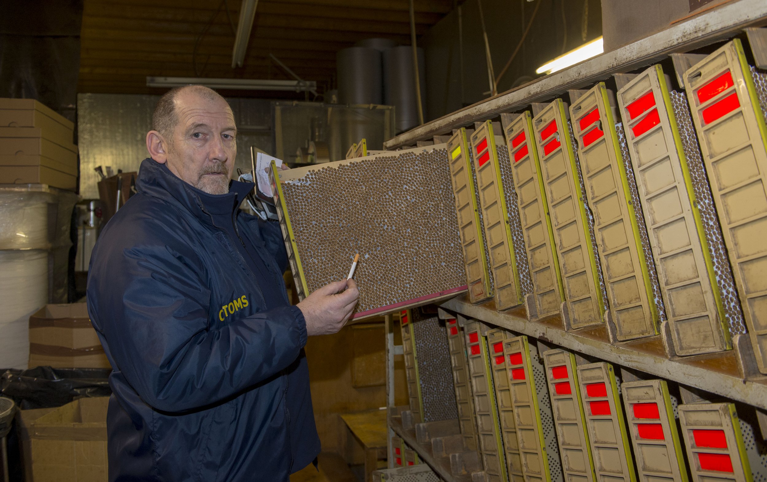 Michael Gilligan, Head of International Operations and Investigations with Customs is pictured with some of the haul