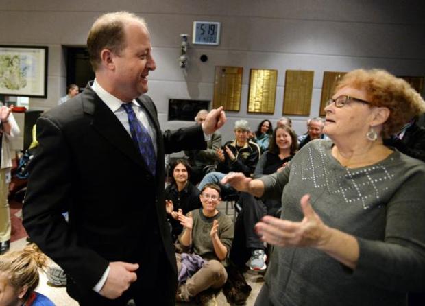 Clela Rorex gets a surprise visit from then Gov.-elect, Jared Polis, during a ceremony celebrating the Boulder County Courthouse's addition to the National Historic Register as a location significant to the history of LGBTQ rights.