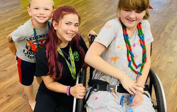 Piper Hopkins (center) with Gracie and a friend at the Whiteville Fun Factory. Piper and Gracie