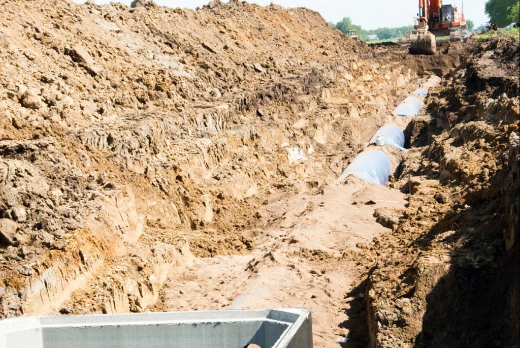 pipeline and excavator