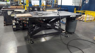 An adjustable table is shown.