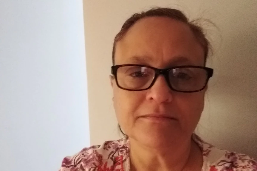 A woman with glasses.