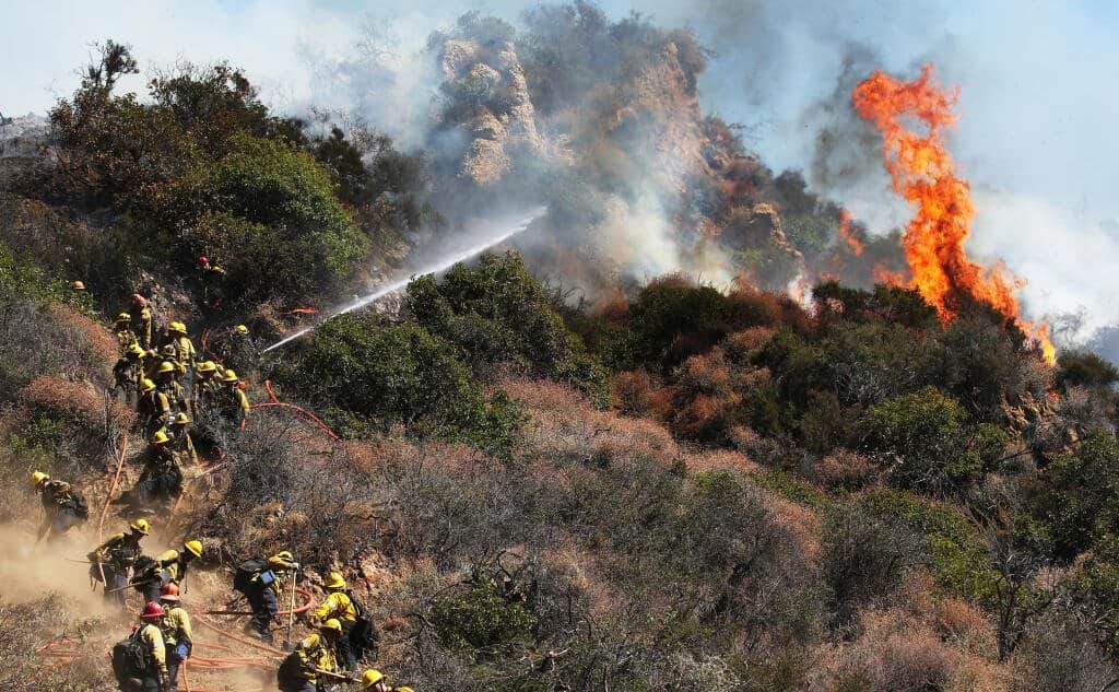 On October 21, 2019, firefighters extinguished a wildfire threatening surrounding hillside houses in Los Angeles' Pacific Palisades area. The fire burned at least 30 acres and forced evacuations
