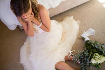 I kicked my bridesmaid out after she spilt red wine down my wedding dress