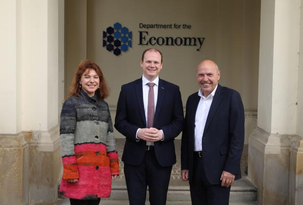 Economy Minister Gordon Lyons pictured with Vicky Newman, Communications Manager for Pulsar - NI Women in STEM, and Dr Bryan Keating, Chair of the DfE Women in STEM Steering Group