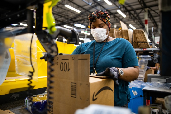 Amazon worker packaging products.