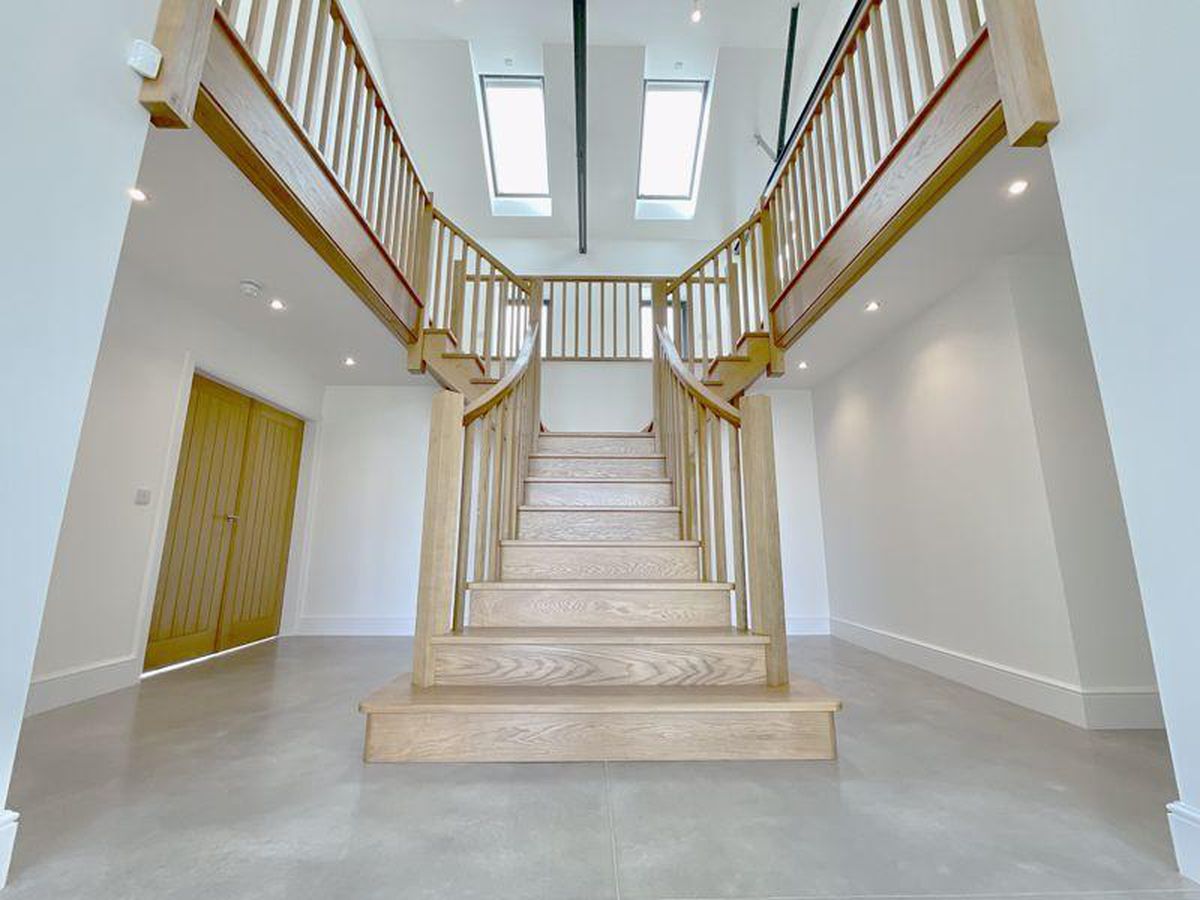 A cinema room is off the entrance hall. Photo: James Du Pavey